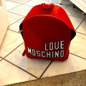Brand new red Moschino book bag